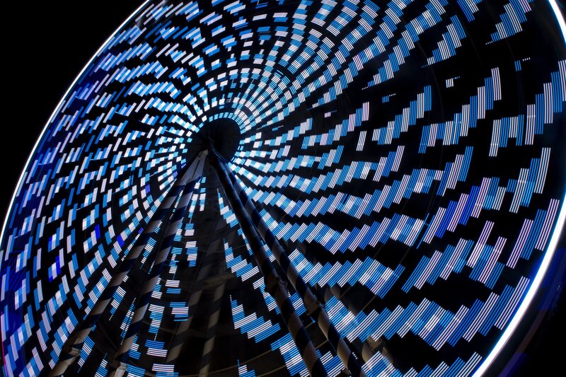illuminated ferris wheel at night