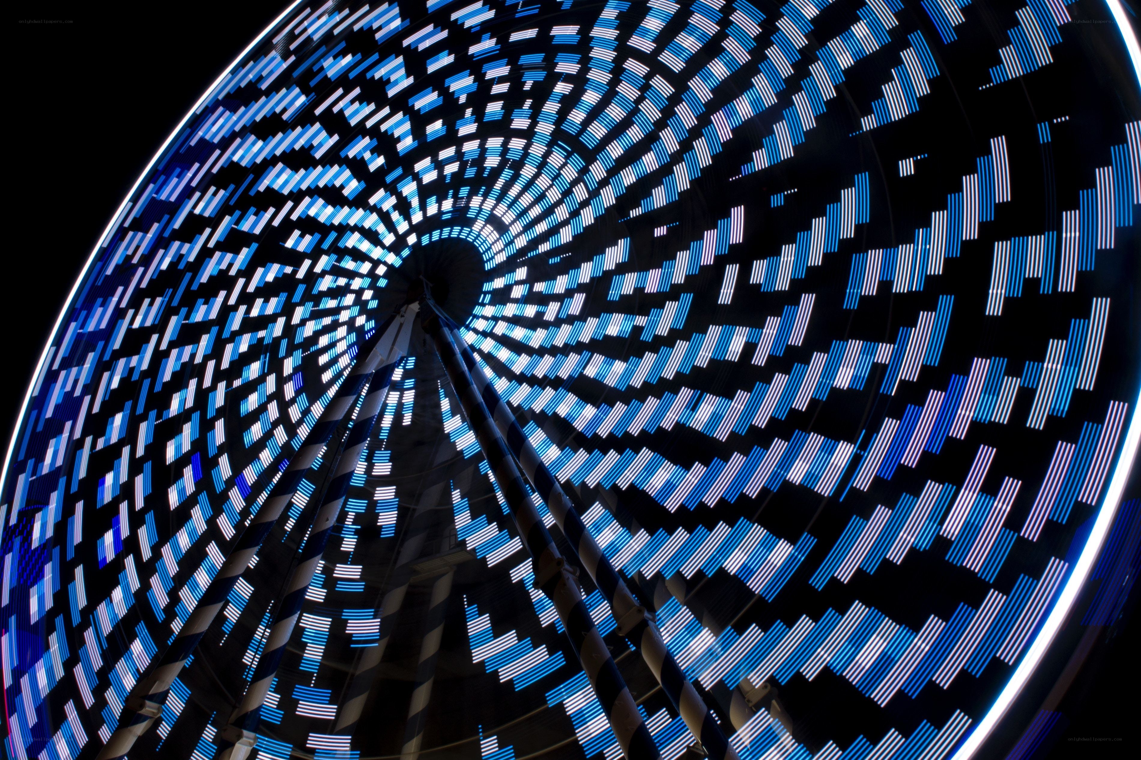 illuminated ferris wheel at night