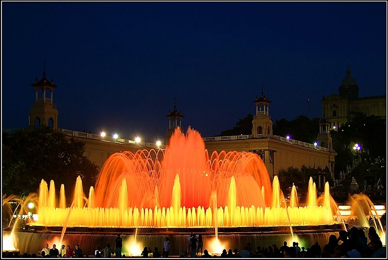 Illuminated Fountain at Night — Orange