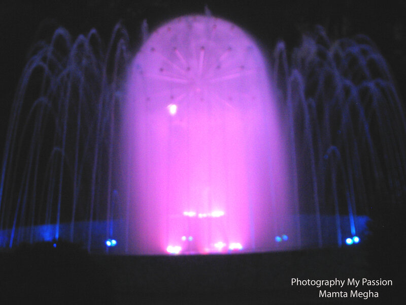 Illuminated Fountain at Night — Purple, Dramatic