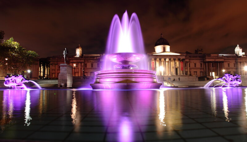 Illuminated Fountain at Night — Purple
