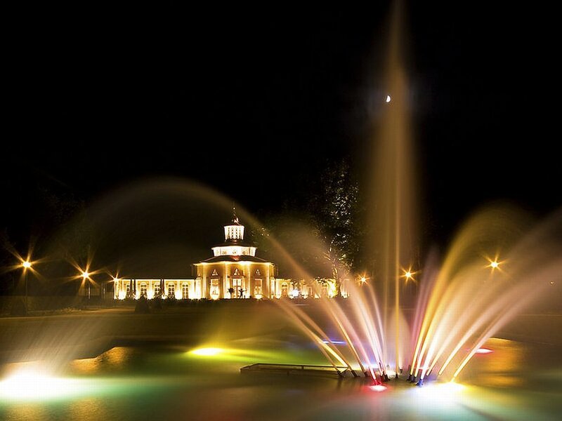 Illuminated Fountain at Night — Yellow, Dramatic