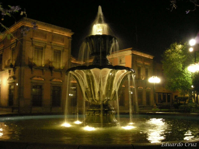 Illuminated Fountain at Night — Yellow