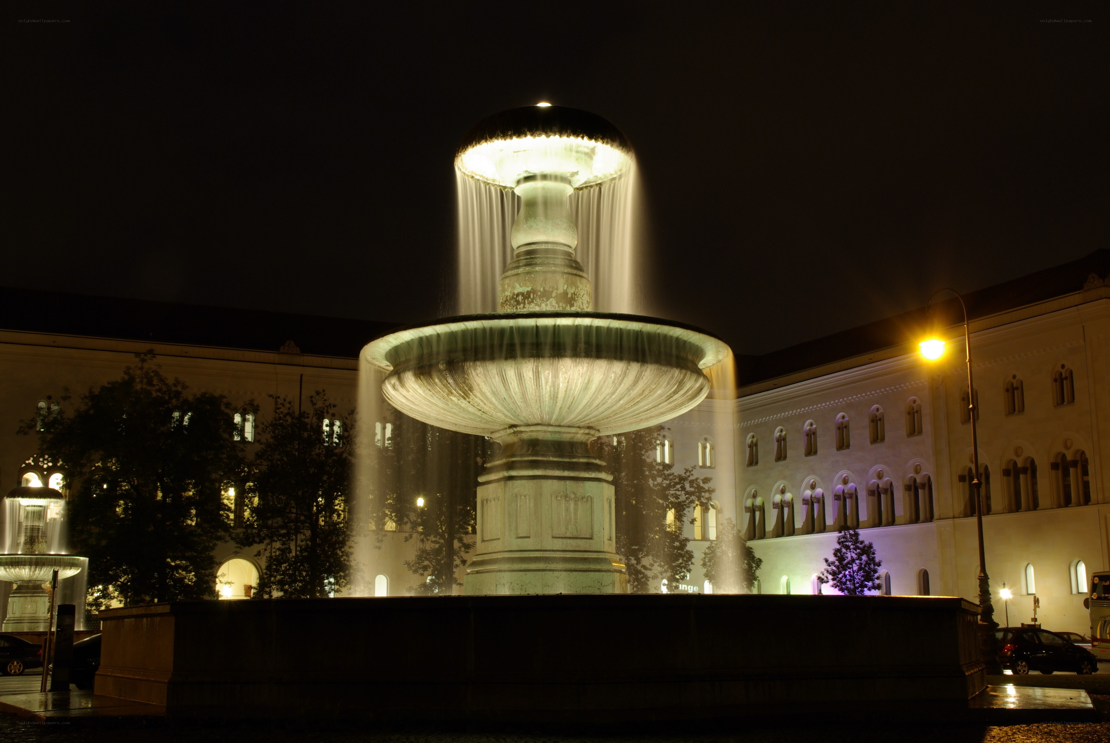 illuminated fountain at night