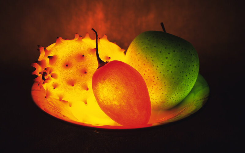 Illuminated Fruits on Plate