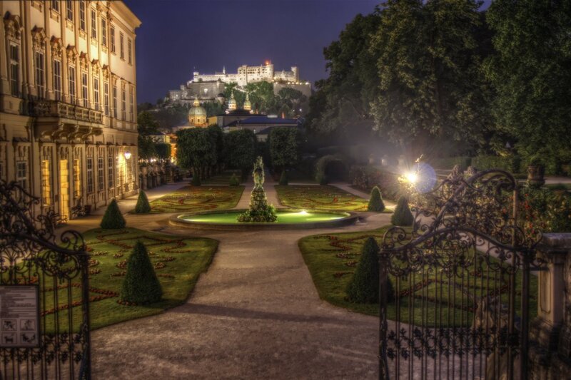 Illuminated Garden at Night — Green, Serene, Photograph, Fountain