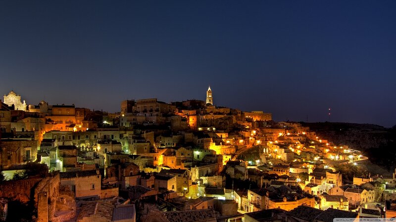 Illuminated Hillside Town
