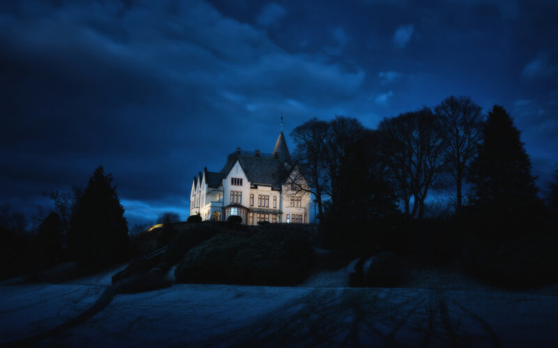 Illuminated House at Night — Blue