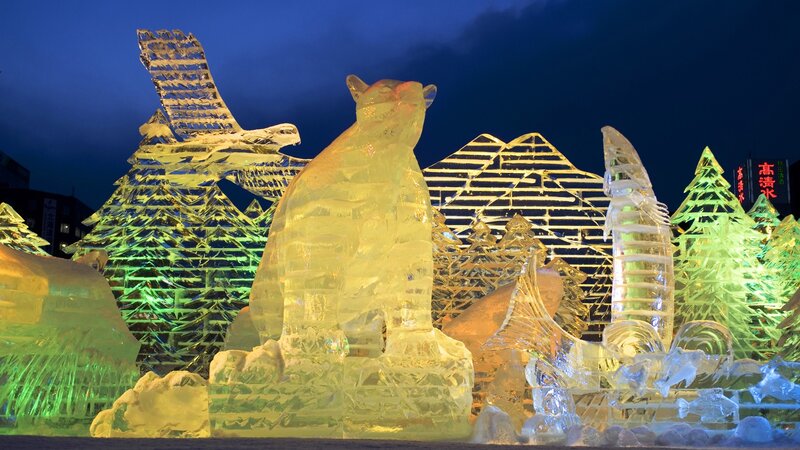 Illuminated ice sculptures at night