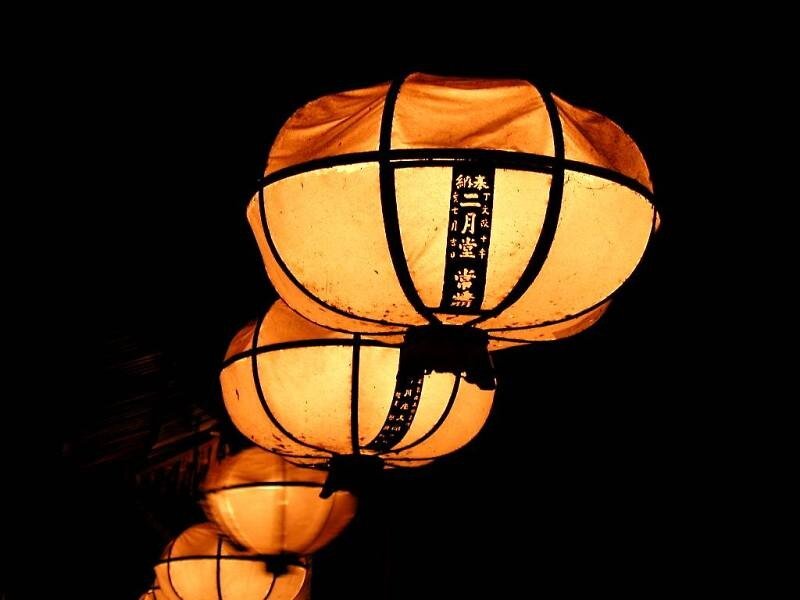 illuminated lanterns at night