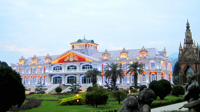 Illuminated Mansion at Dusk
