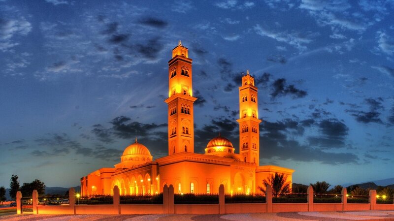 illuminated mosque at dusk