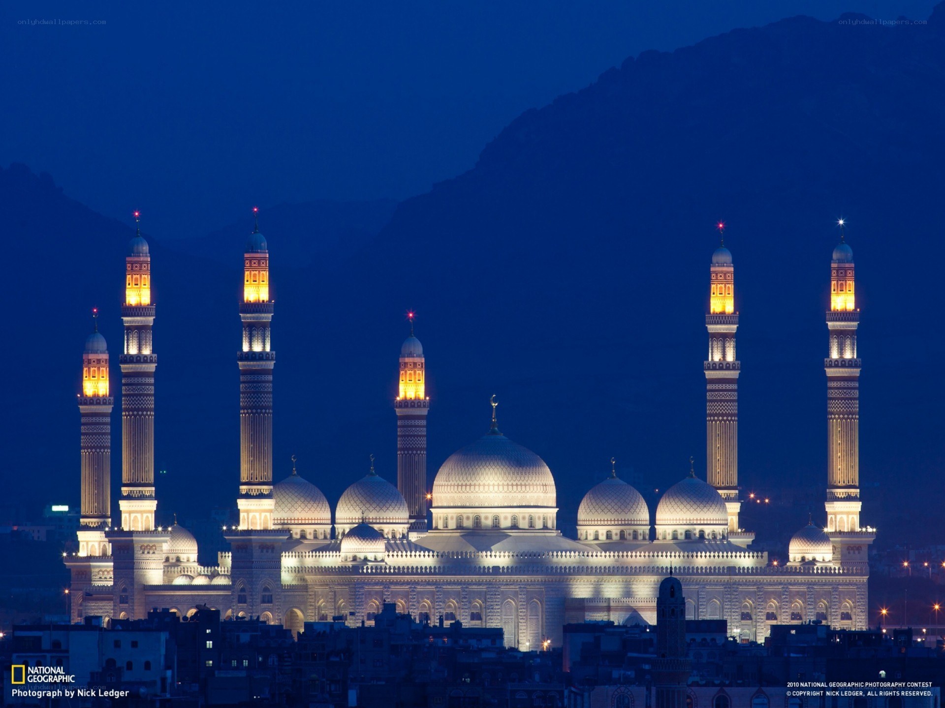 illuminated mosque at night