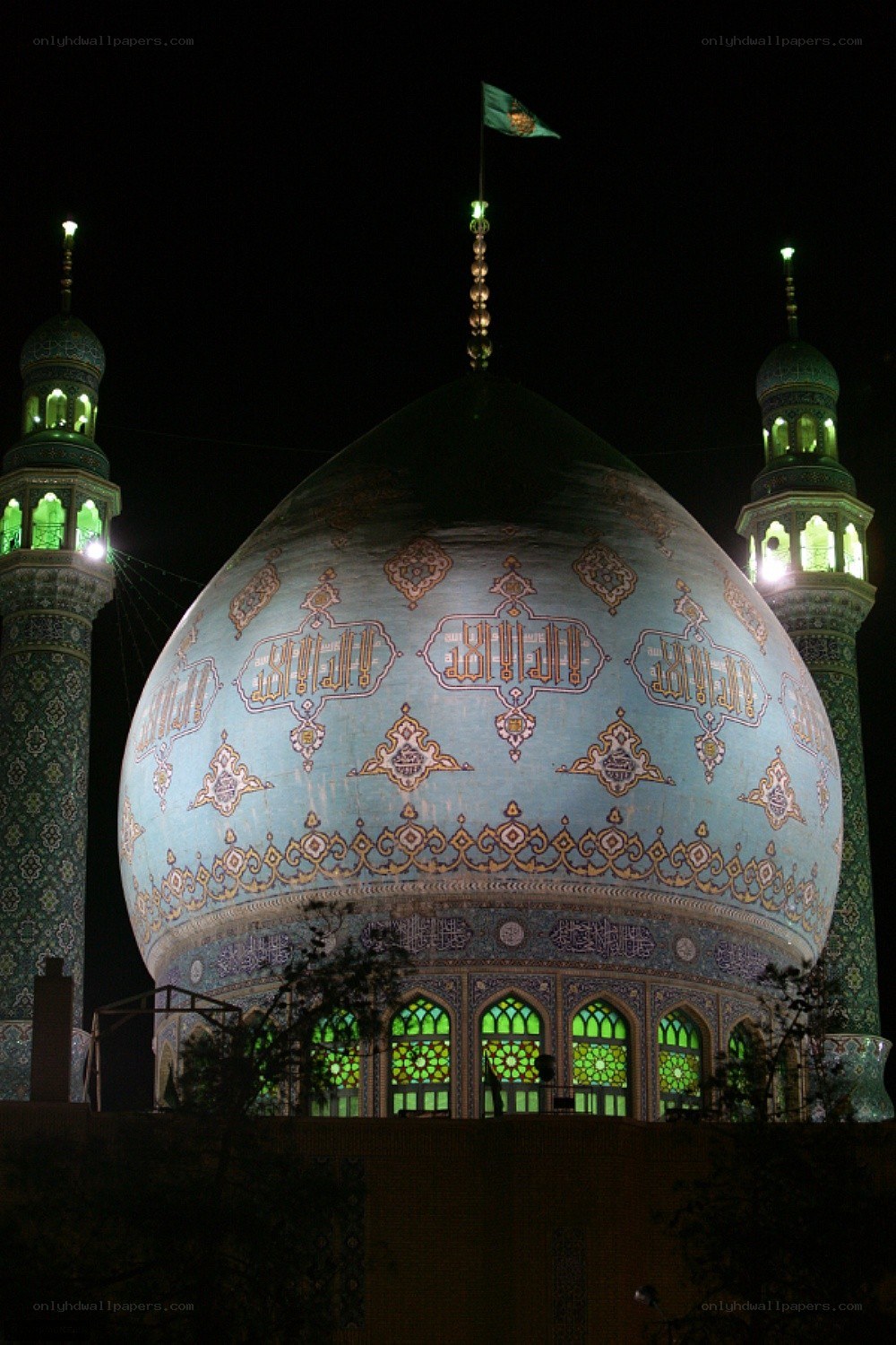 illuminated mosque dome at night