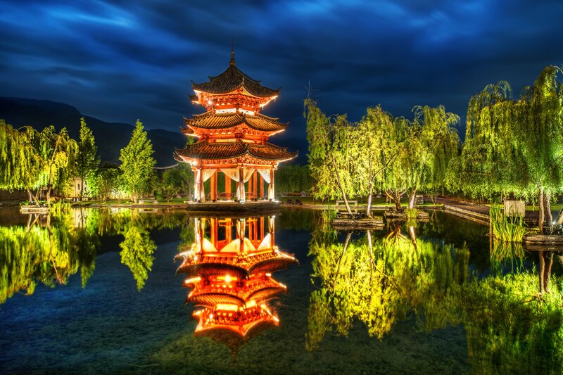 Illuminated pagoda at night