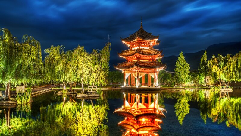 Illuminated pagoda at night