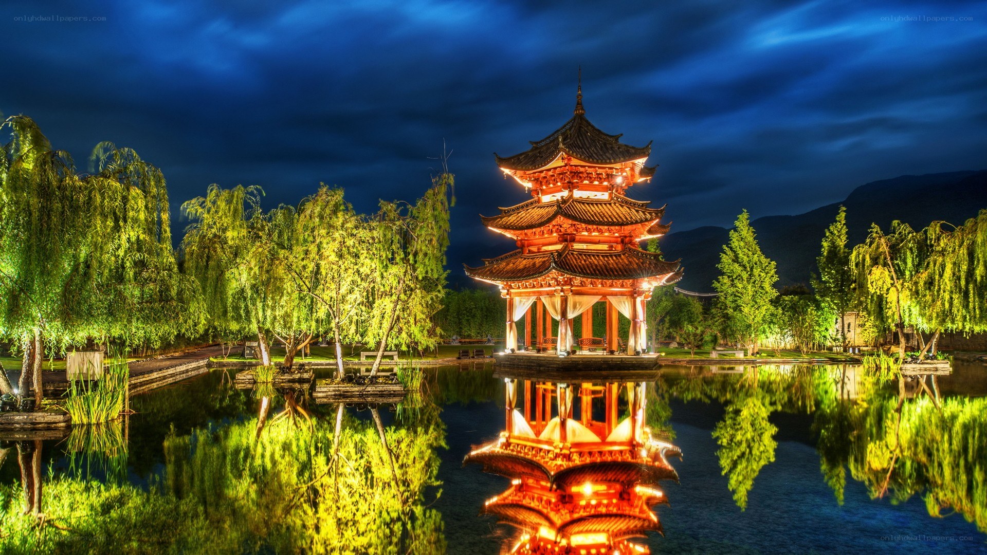 Illuminated pagoda at night