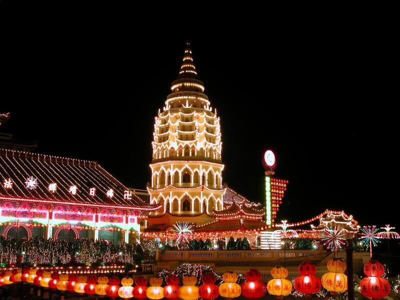 Illuminated Pagoda at Night — Red