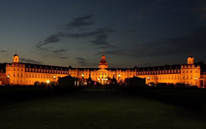 illuminated palace at dusk