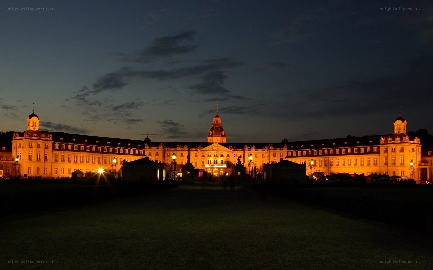 illuminated palace at dusk