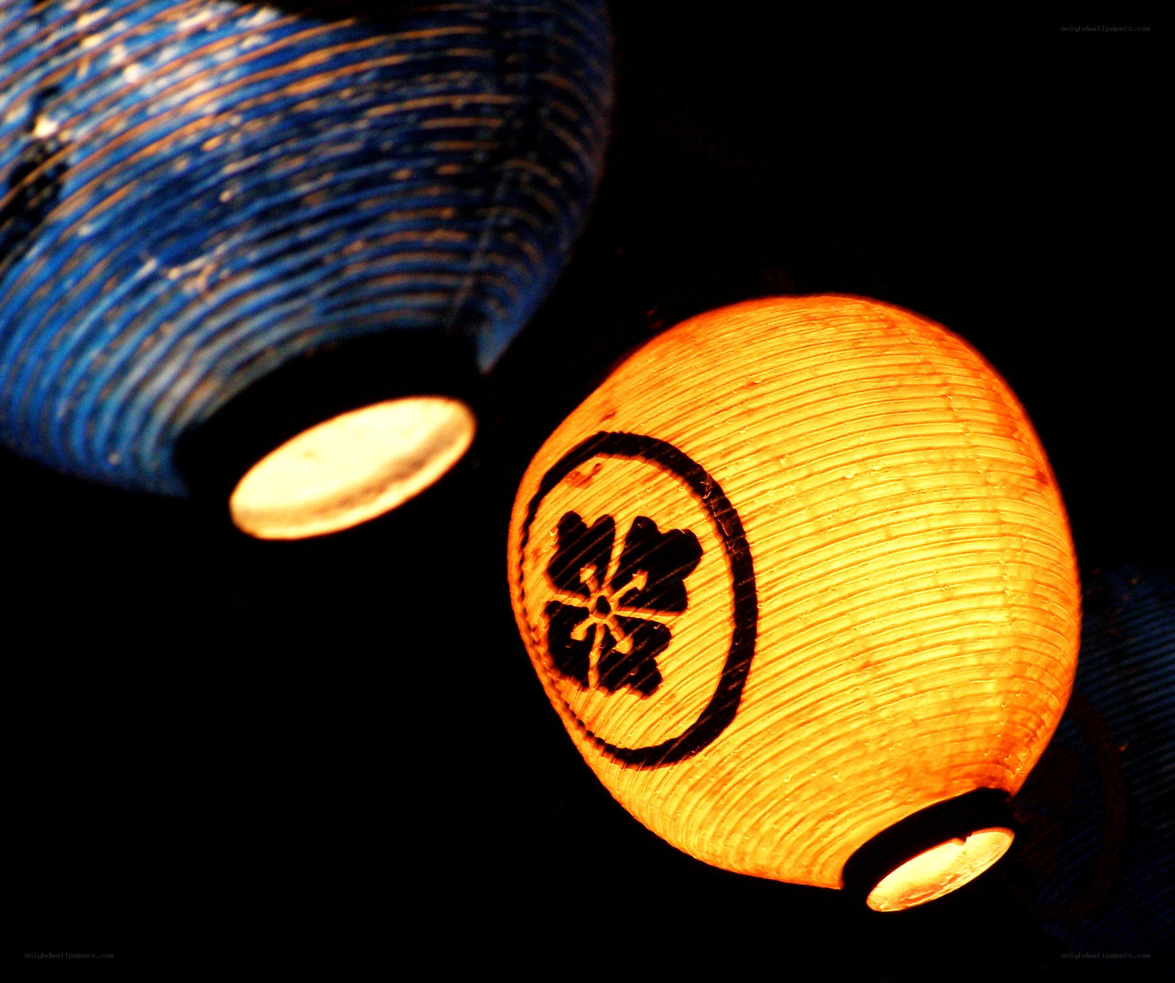 illuminated paper lanterns at night