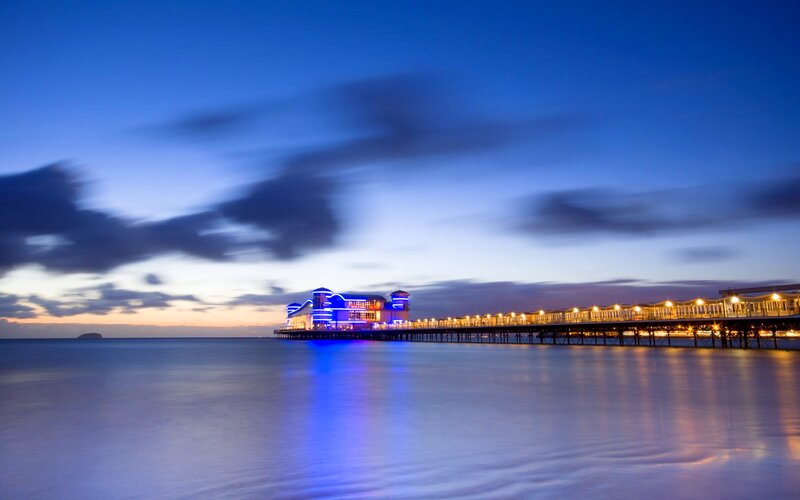 Illuminated Pier at Dusk — Blue