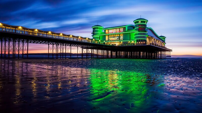 Illuminated Pier at Dusk — Green, Dramatic, Sunset, Photograph, Building, Beach