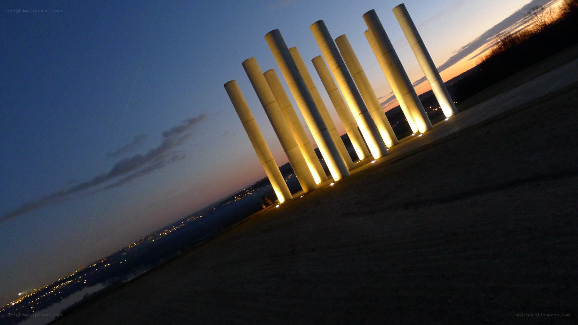 illuminated pillars at dusk