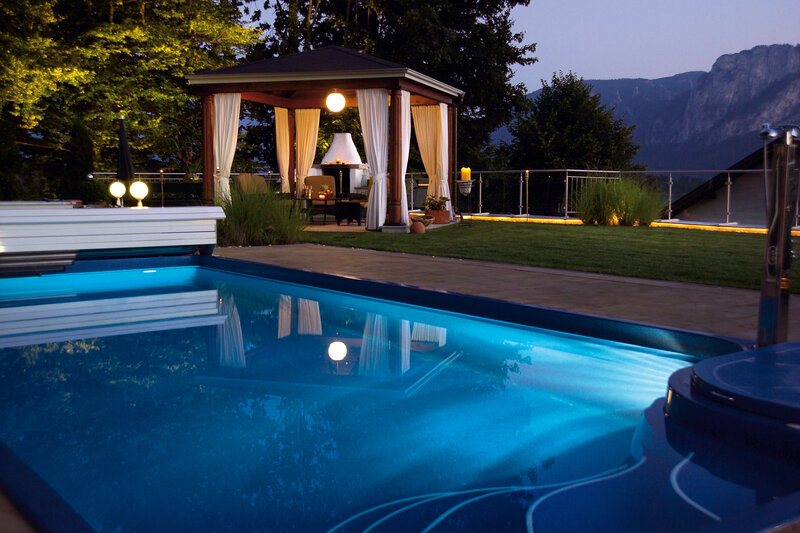 Illuminated Pool at Dusk — Blue, Serene, Night
