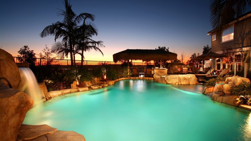 Illuminated Pool at Dusk — Blue, Serene, Sunset