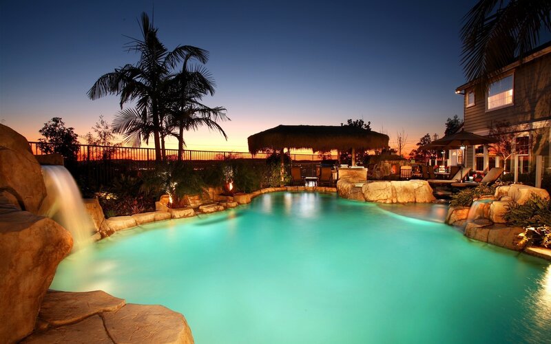 Illuminated Pool at Dusk — Teal