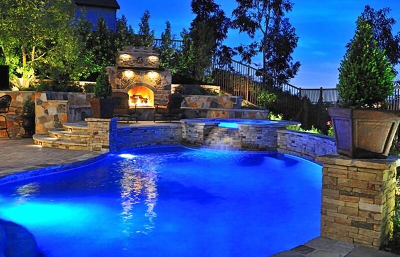 Illuminated Pool at Night — Blue, Serene, Photograph, Fireplace