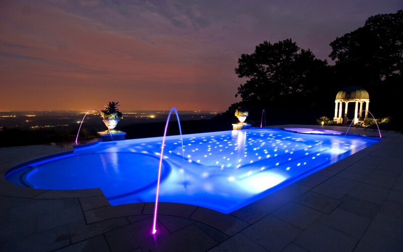 Illuminated Pool at Night — Blue, Serene, Photograph, Fountains