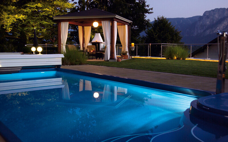 Illuminated Pool at Night — Blue, Serene, Photograph