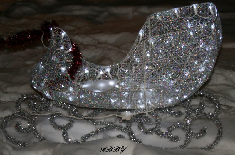Illuminated Sleigh in Snow