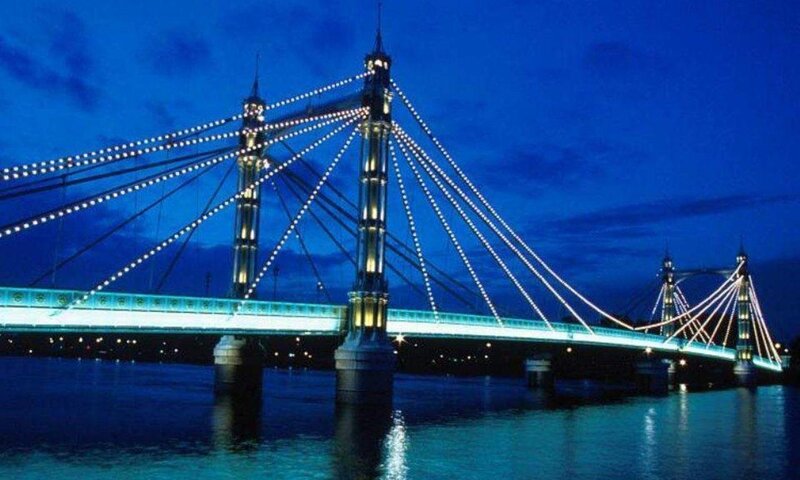 illuminated suspension bridge at night