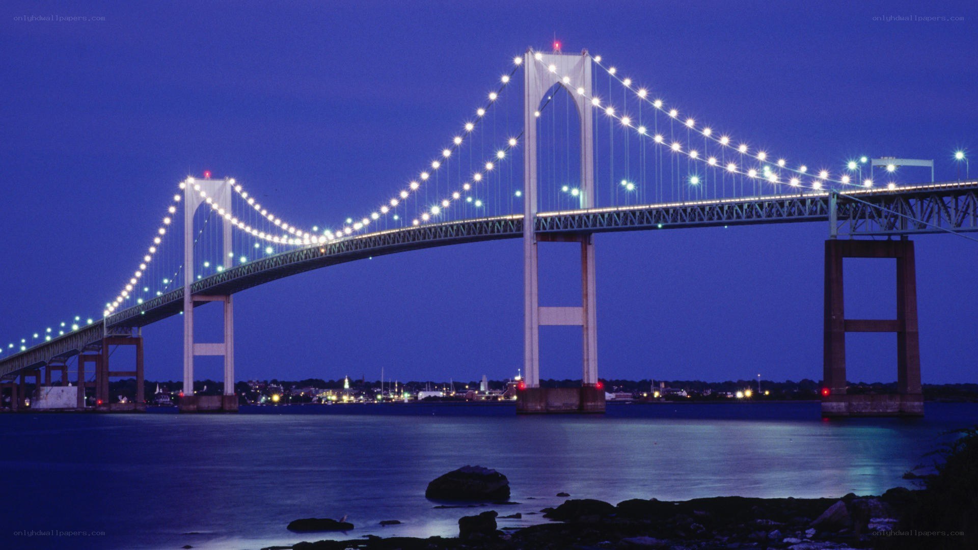 illuminated suspension bridge at night