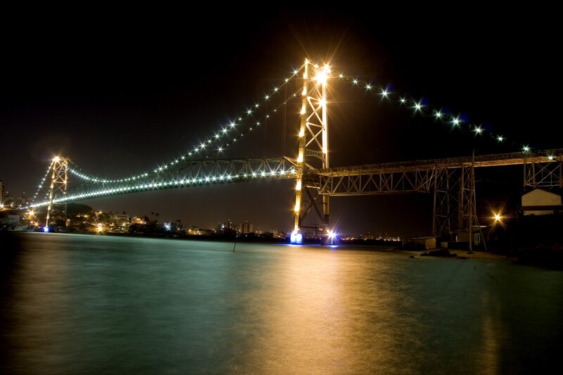 Illuminated Suspension Bridge — Black, Dramatic