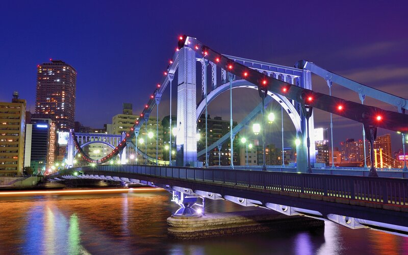 Illuminated Suspension Bridge — Blue, Dramatic, Night, Photograph, River