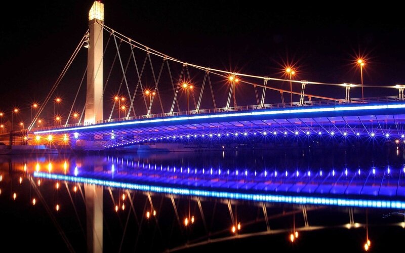 Illuminated Suspension Bridge — Blue, Dramatic, Night