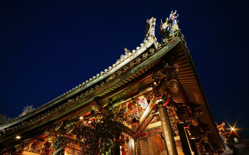 illuminated temple roof at night