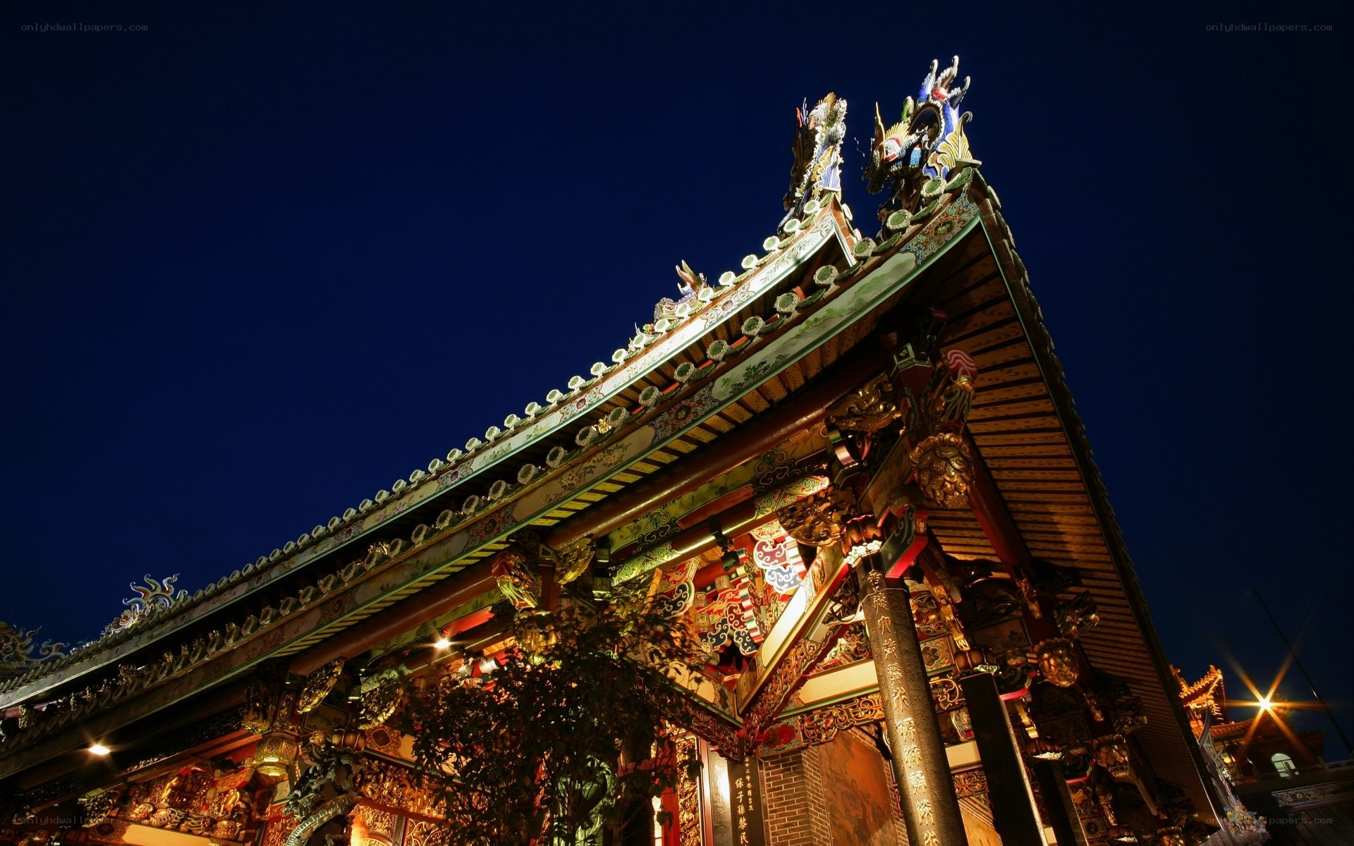 illuminated temple roof at night