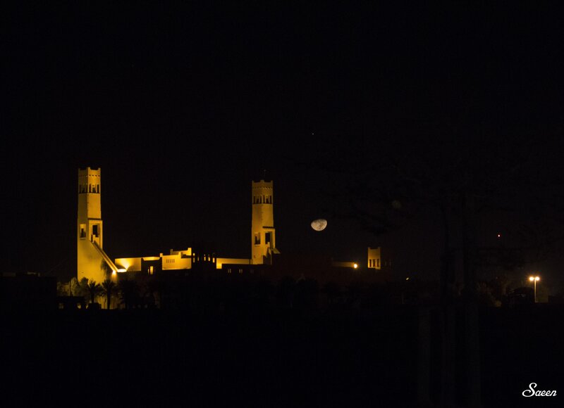 Illuminated Towers at Night — Black
