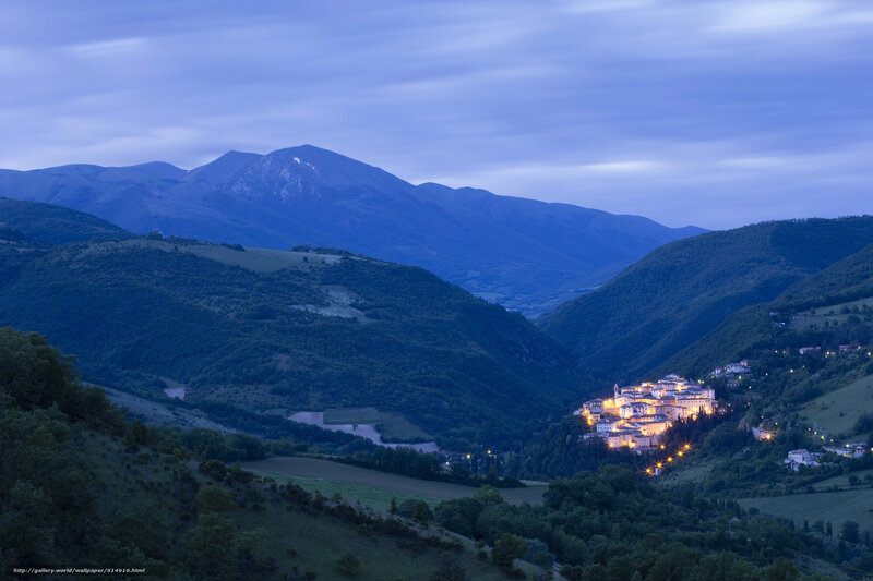 Illuminated Village in Valley