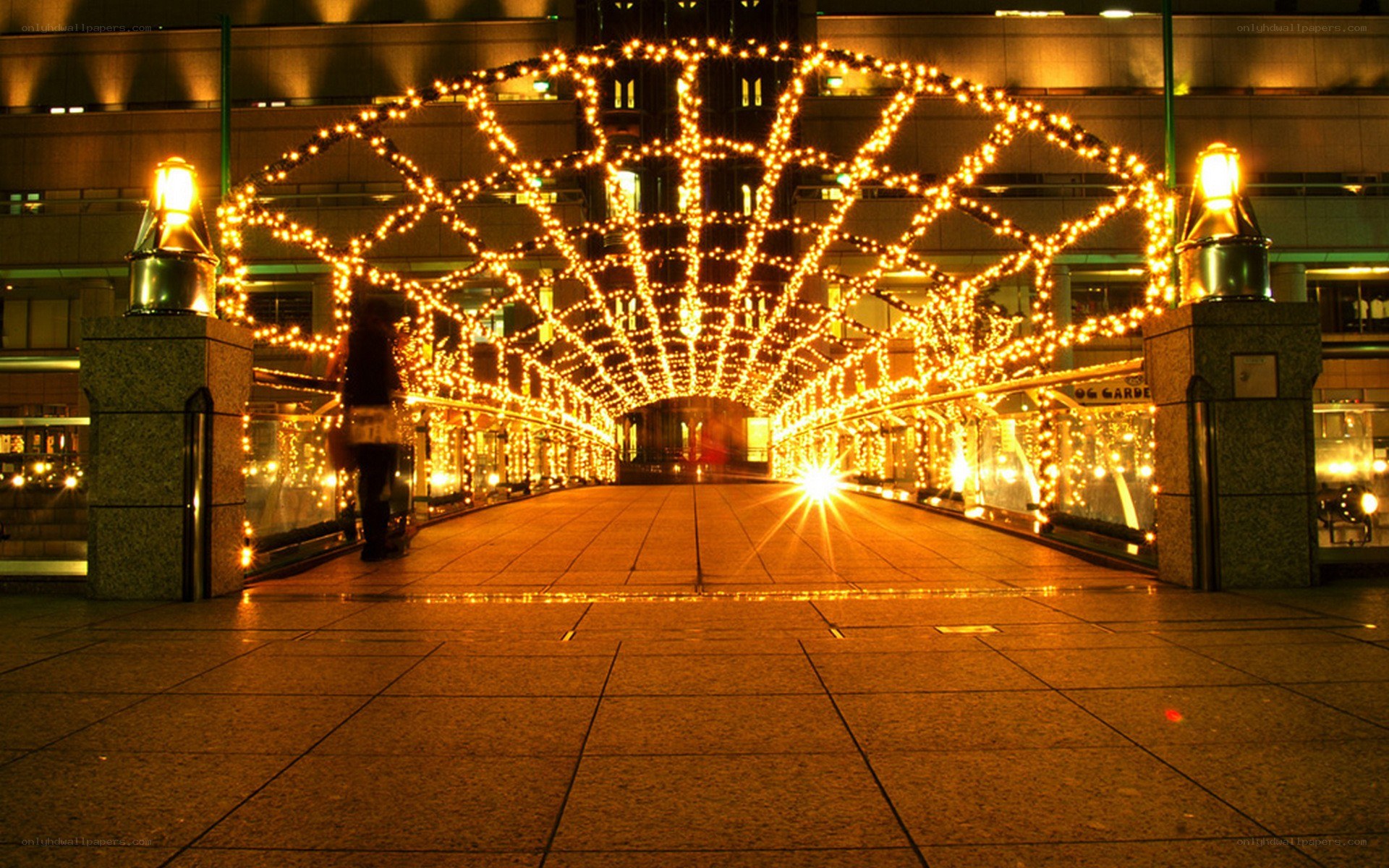 illuminated walkway at night