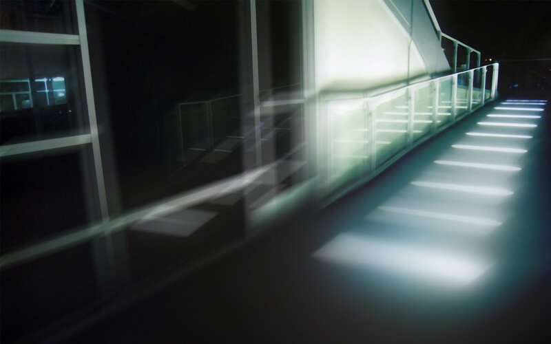 Illuminated Walkway at Night — Black