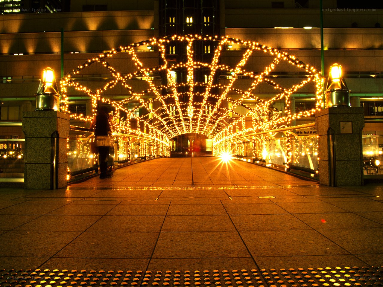 illuminated walkway at night