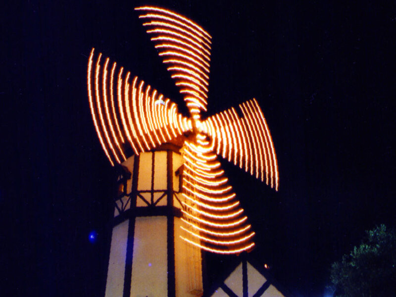 Illuminated Windmill at Night