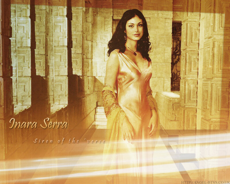 Inara Serra in golden gown