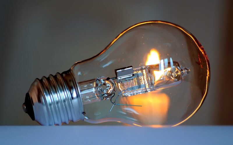 Incandescent Light Bulb — Yellow, Dramatic